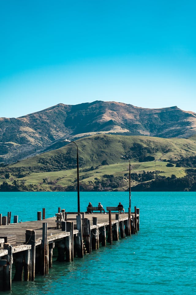 Pier extending into the water in Akaroa New Zealand