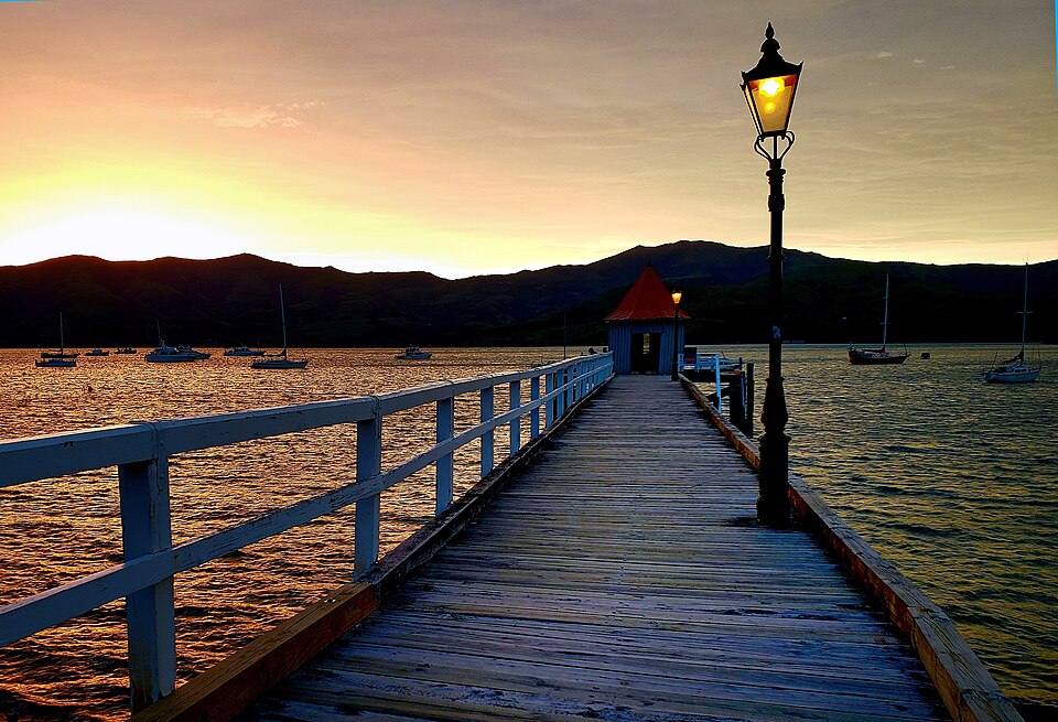 Sunset over Akaroa Harbour in New Zealand