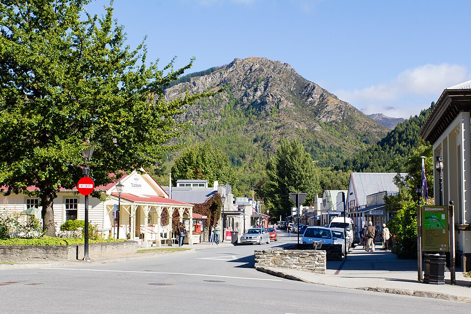 Historic main street with mountain backdrop in Arrowtown New Zealand