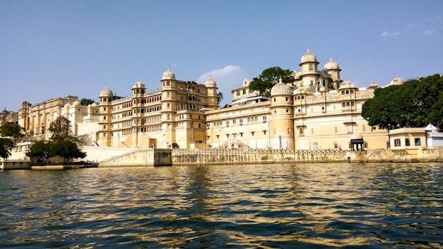 City Palace of Udaipur rising above Lake Pichola — a stunning Asian travel destination
