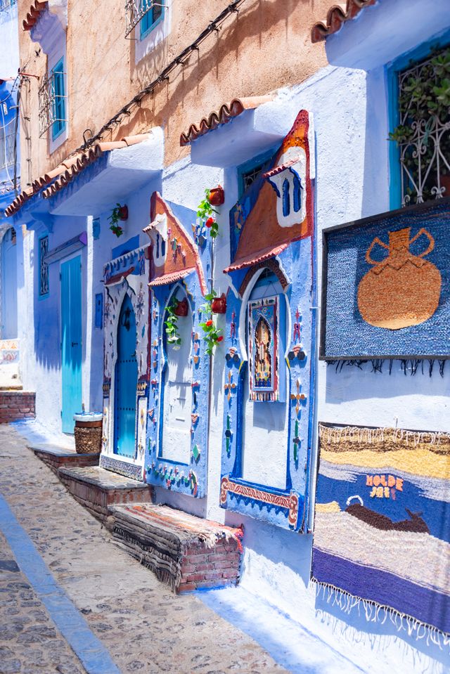 Ornate blue townhouse facade in Chefchaouen Morocco