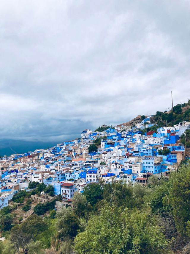 Scenic view of Chefchaouen surrounded by mountains in Morocco
