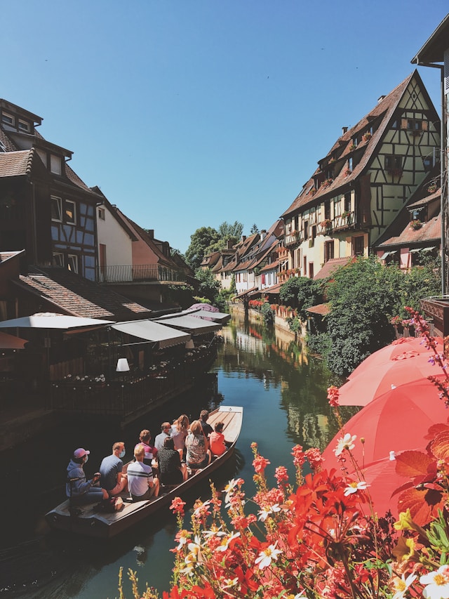 Visitors on a boat tour in Colmar France