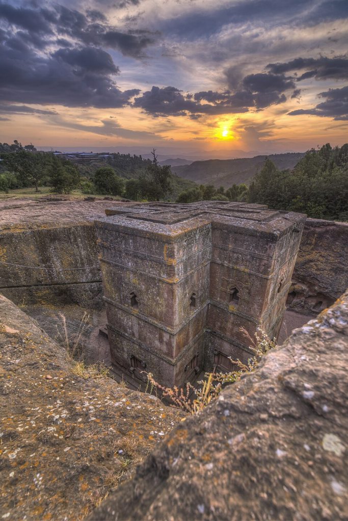 Church of Saint George bathed in golden evening light in Lalibela