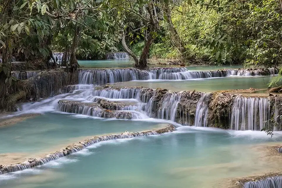 Limestone terraces and emerald pools at Kuang Si Falls Laos