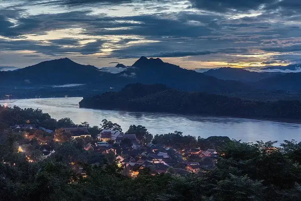 Mekong River and mountains viewed from Mount Phou Si at dusk