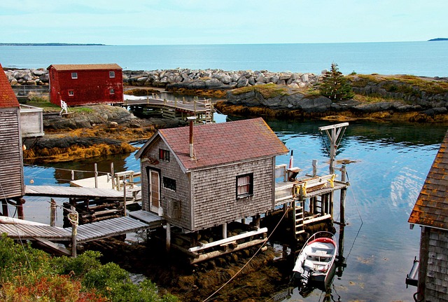 Traditional fishing sheds and boathouses along the waterfront in Lunenburg Nova Scotia Canada