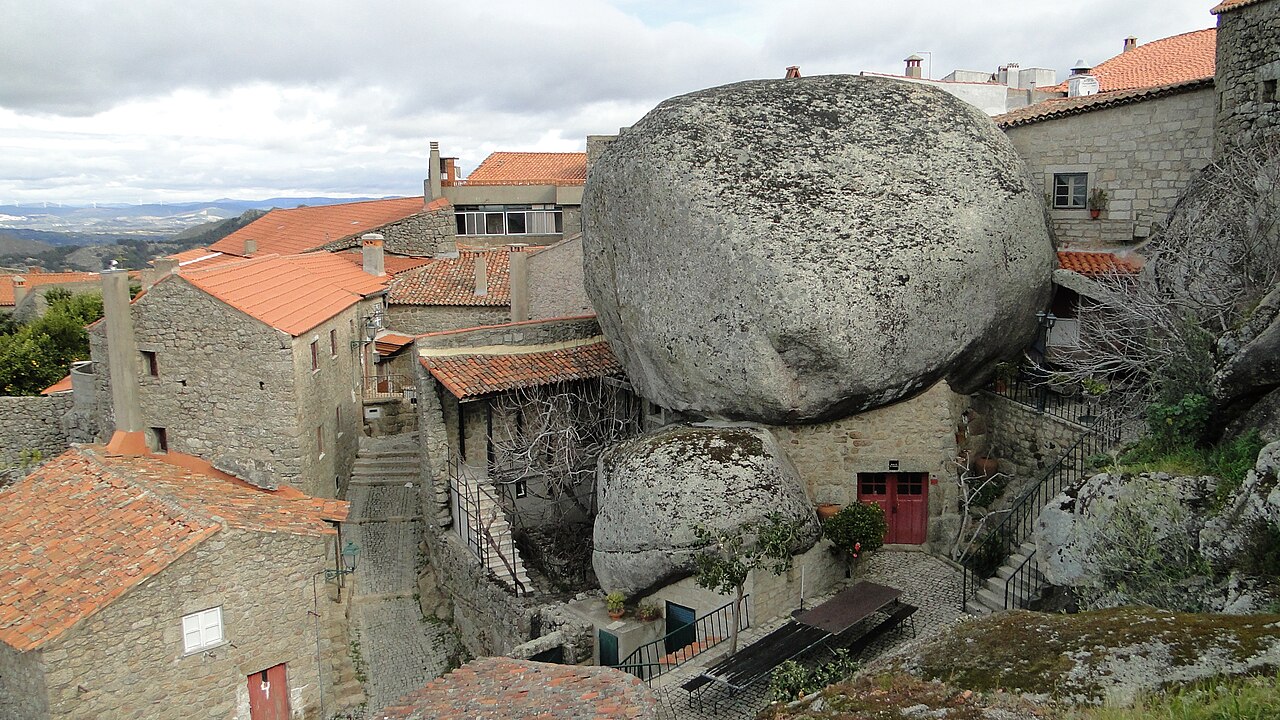Giant granite boulder incorporated into a house in Monsanto Portugal