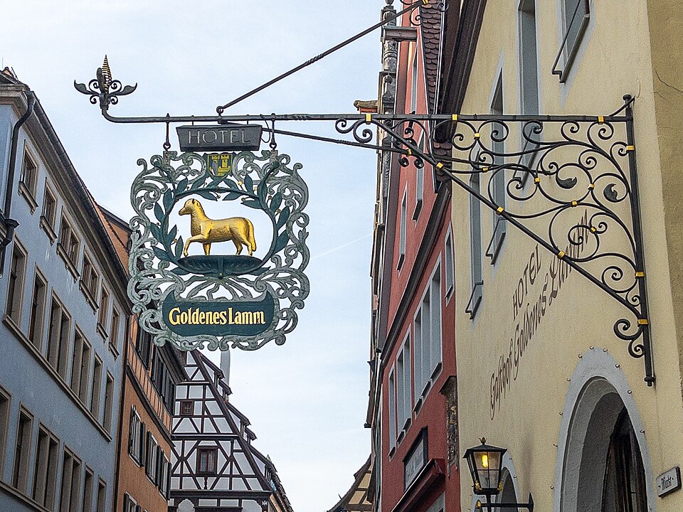 Wrought-iron Goldenes Lamm hotel sign with a golden lamb in Rothenburg ob der Tauber