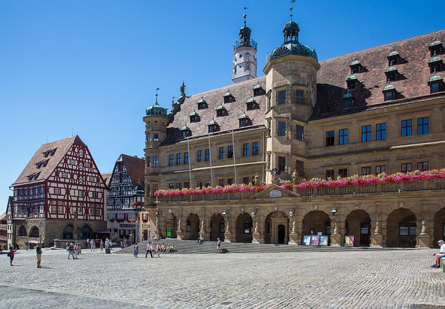 The Town Hall (Rathaus) and Marktplatz in Rothenburg ob der Tauber with half-timbered houses