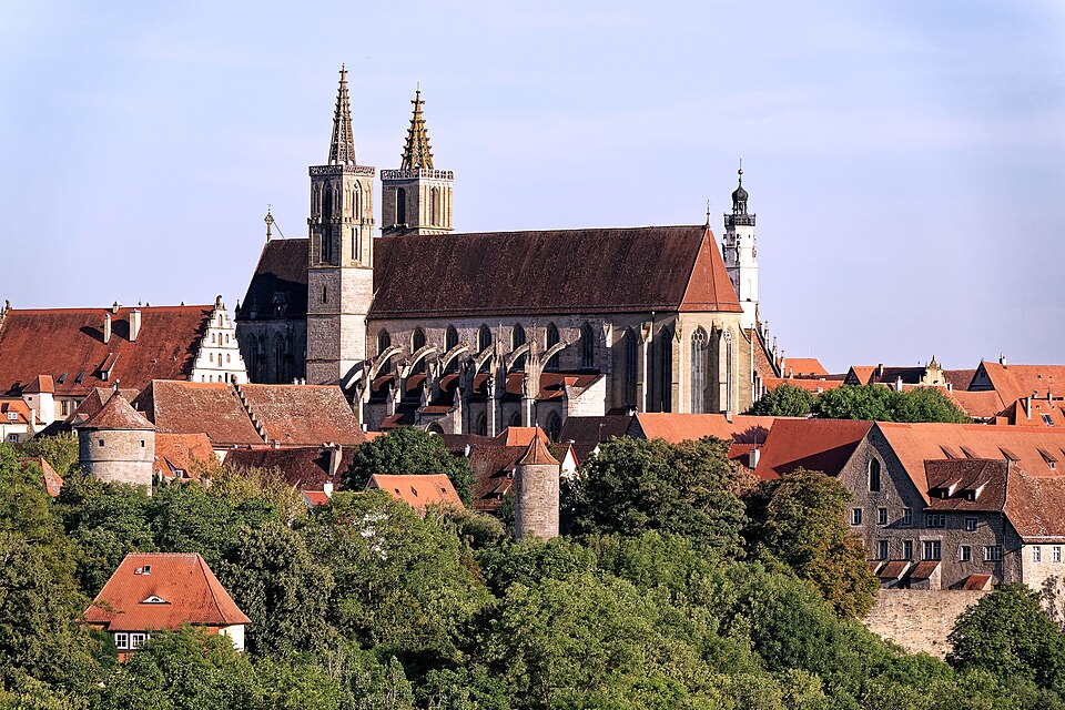 St. Jakobskirche rising above the red rooftops of Rothenburg ob der Tauber