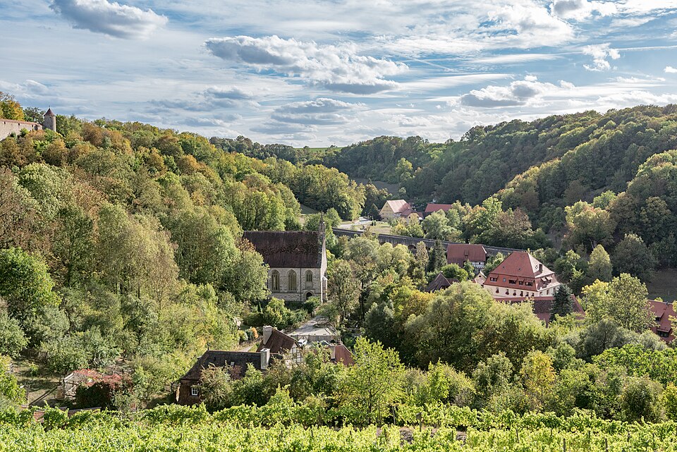 View over the Tauber Valley below Rothenburg with the Kobolzeller church among the trees