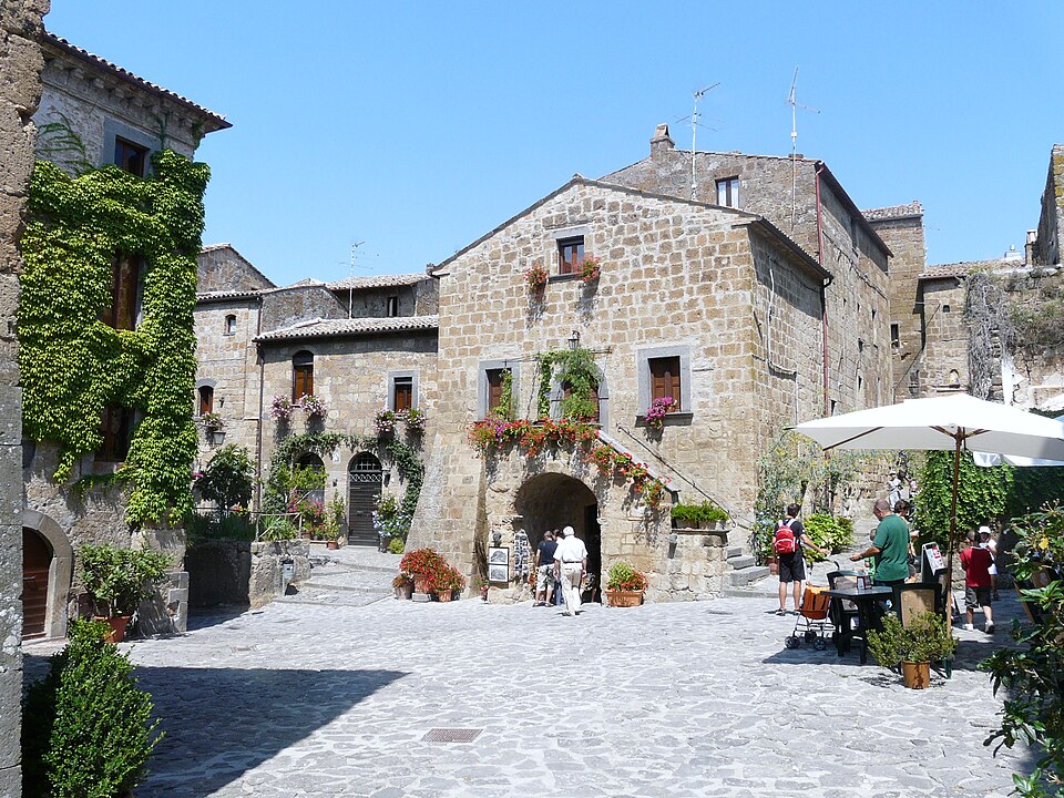 Tourists gathered in the main piazza of Civita di Bagnoregio