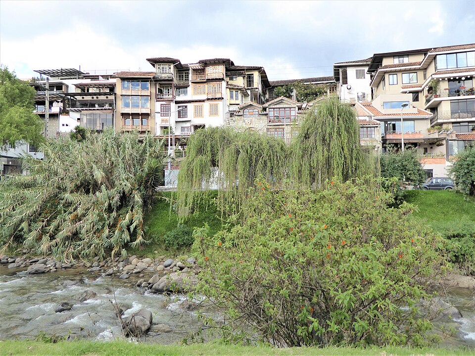 Riverside colonial houses overlooking the Tomebamba River
