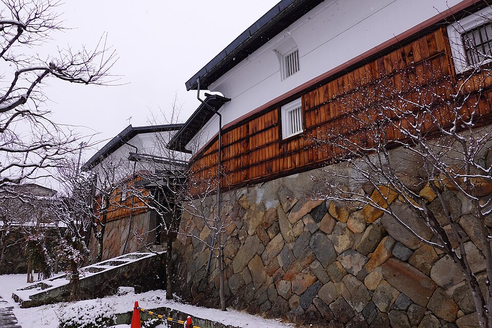 Snow falling on the Takayama Museum of History and Art building