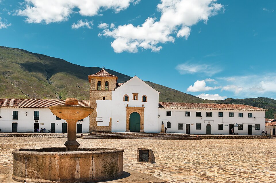 Stone water fountain in front of the church on Villa de Leyva's Plaza Mayor