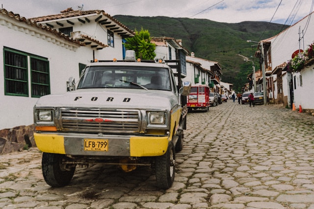 Vintage Ford pickup truck parked on a cobblestone street in Villa de Leyva