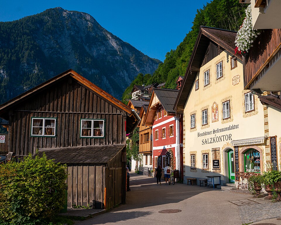 Morning light on Hallstatt's village street near the historic Salzkontor building