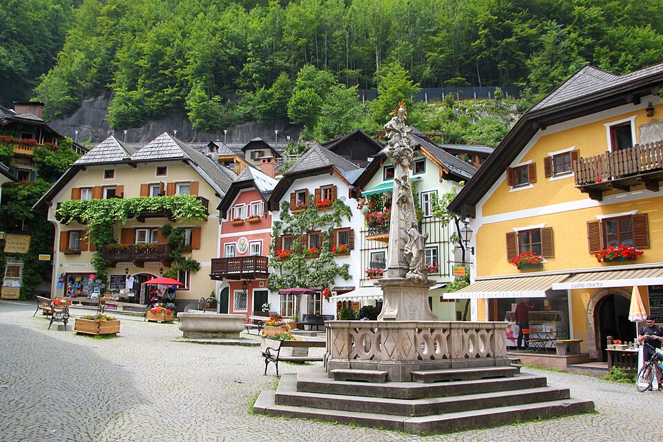 The Holy Trinity Column standing in Hallstatt's market square