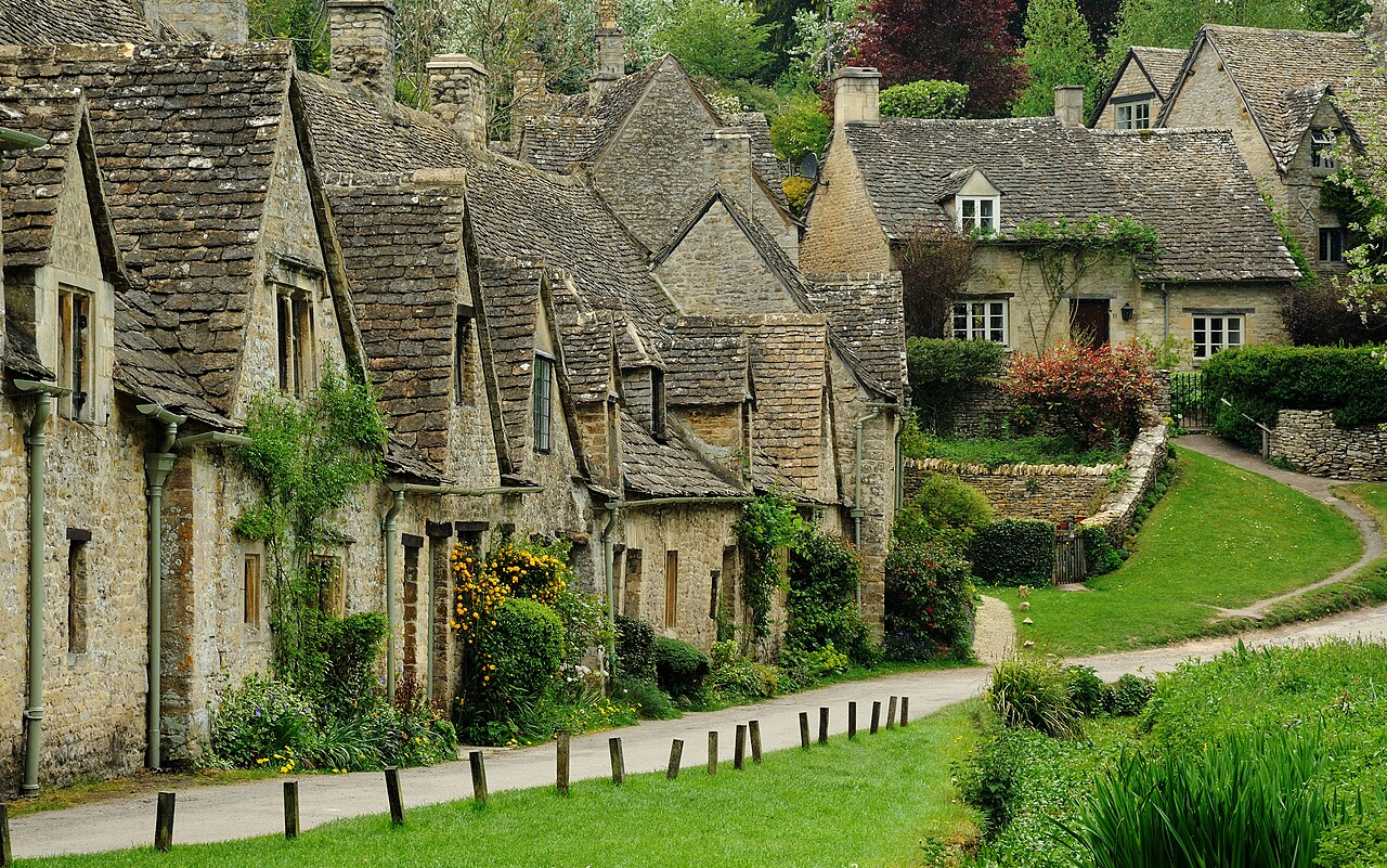 Row of old stone weavers' cottages on Arlington Row in Bibury England