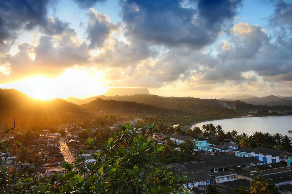Sunset over the rooftops of Baracoa and the surrounding hills