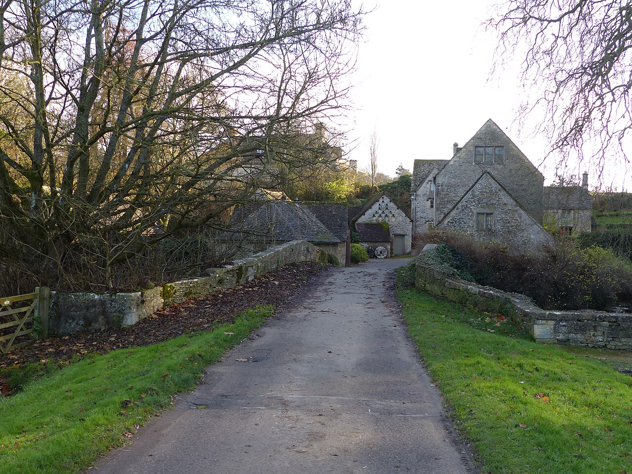 Stone bridge over the River Coln near the old mill