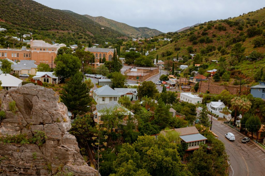 Houses perched on a steep mountainside above the old town