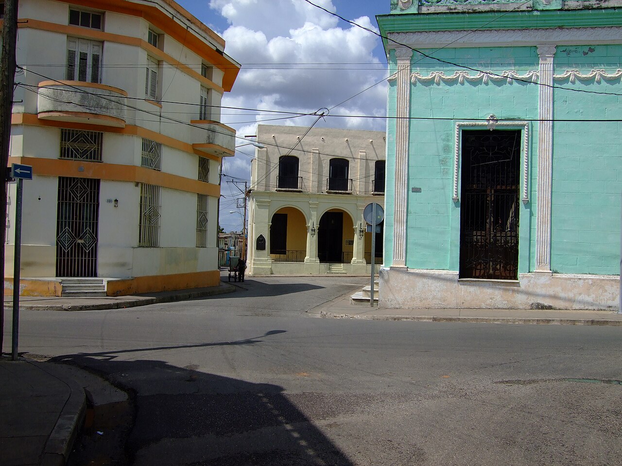 Narrow street with pastel houses