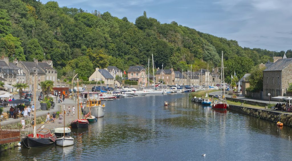 Boats moored at the river port below the town