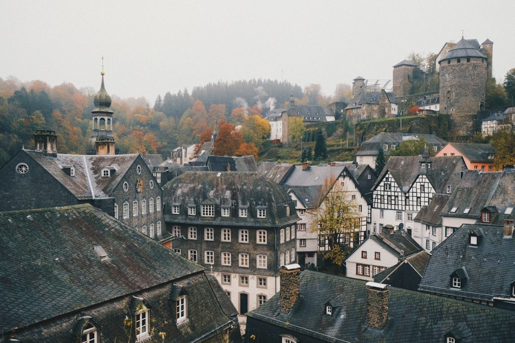 Slate rooftops and towers of an old Eifel town in autumn