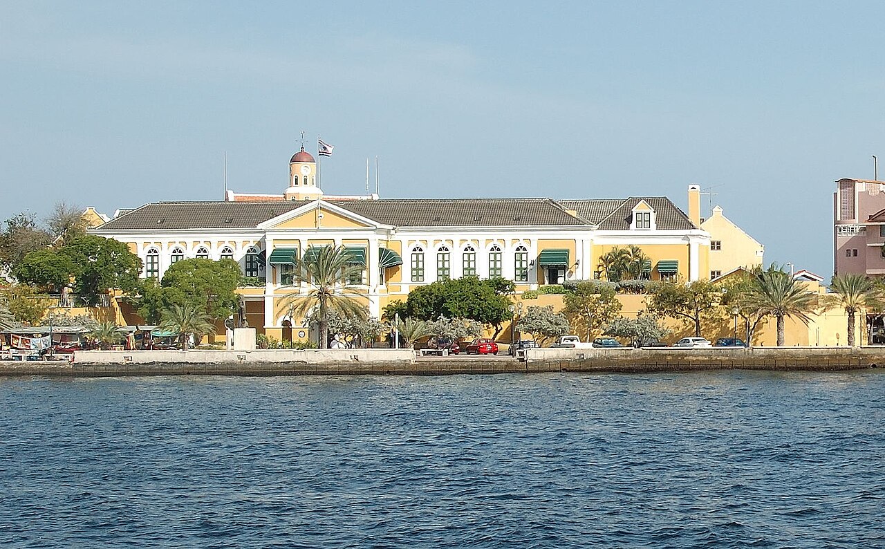 Yellow walls of Fort Amsterdam at the harbor entrance
