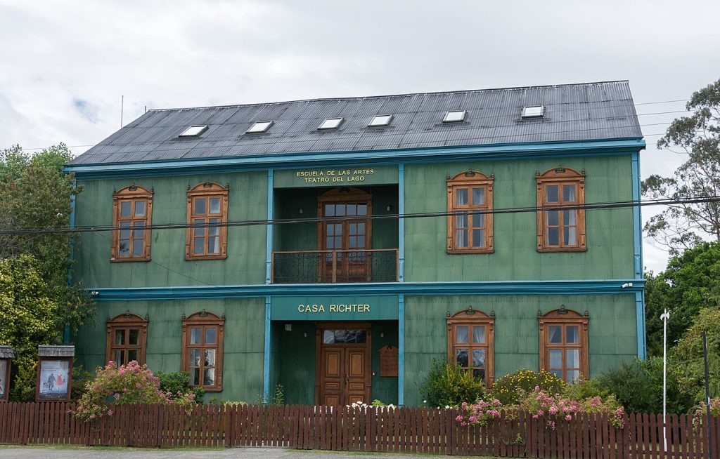 Green wooden house built in the German colonial style