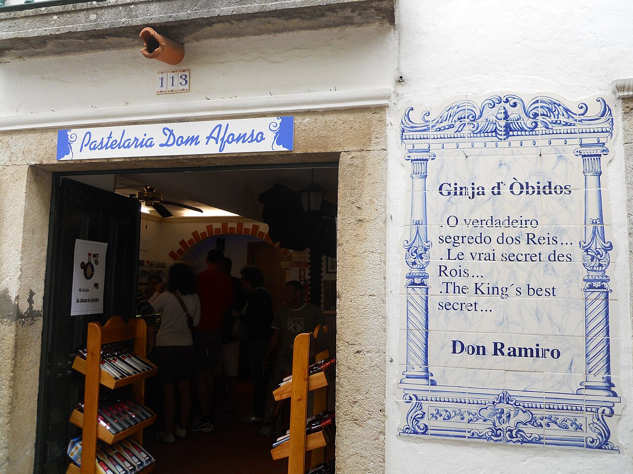 Bottle and glasses of ginjinha, the sour cherry liqueur of Óbidos