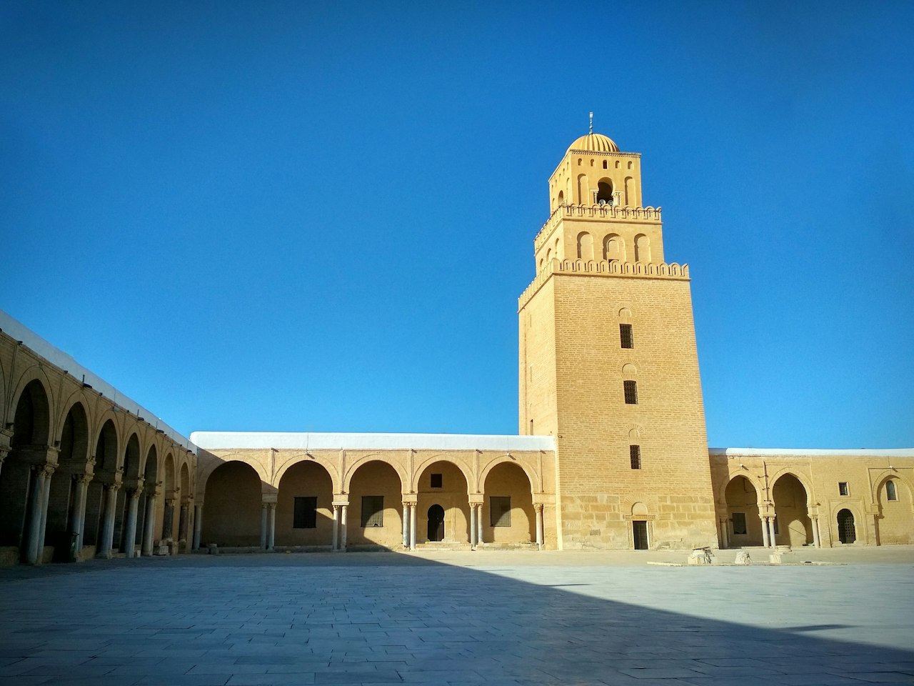 Kairouan Tunisia mosque under a blue sky