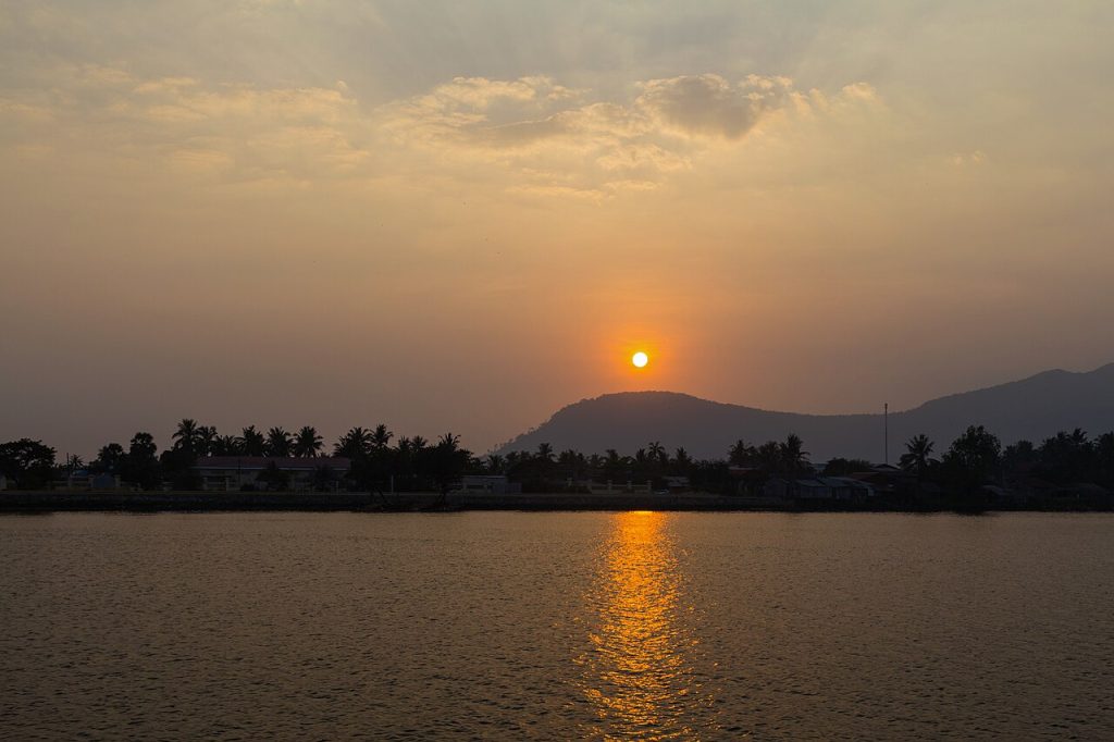 Kampot Cambodia sunset over the Praek Tuek Chhu River and the Elephant Mountains