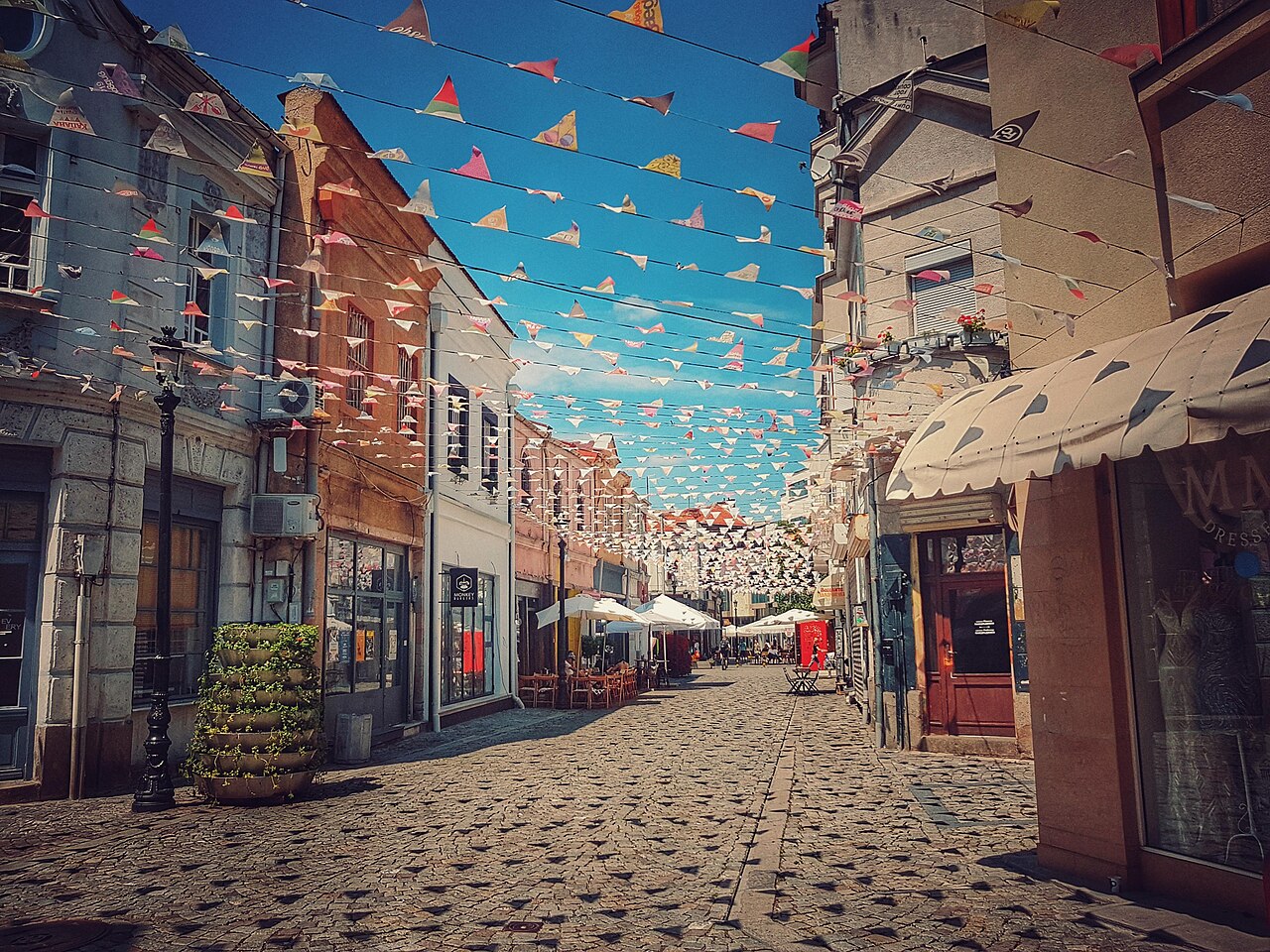 Street with cafes and colourful decorations in the Kapana district