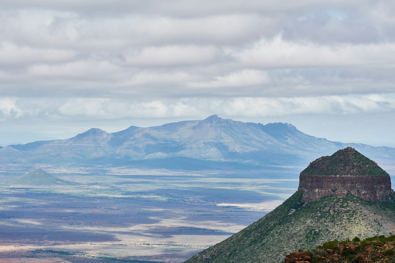 Rocky mountain under white clouds