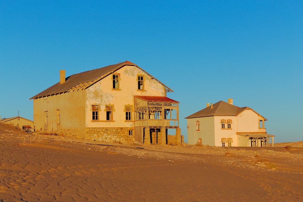 Abandoned houses in the desert sand at Kolmanskop