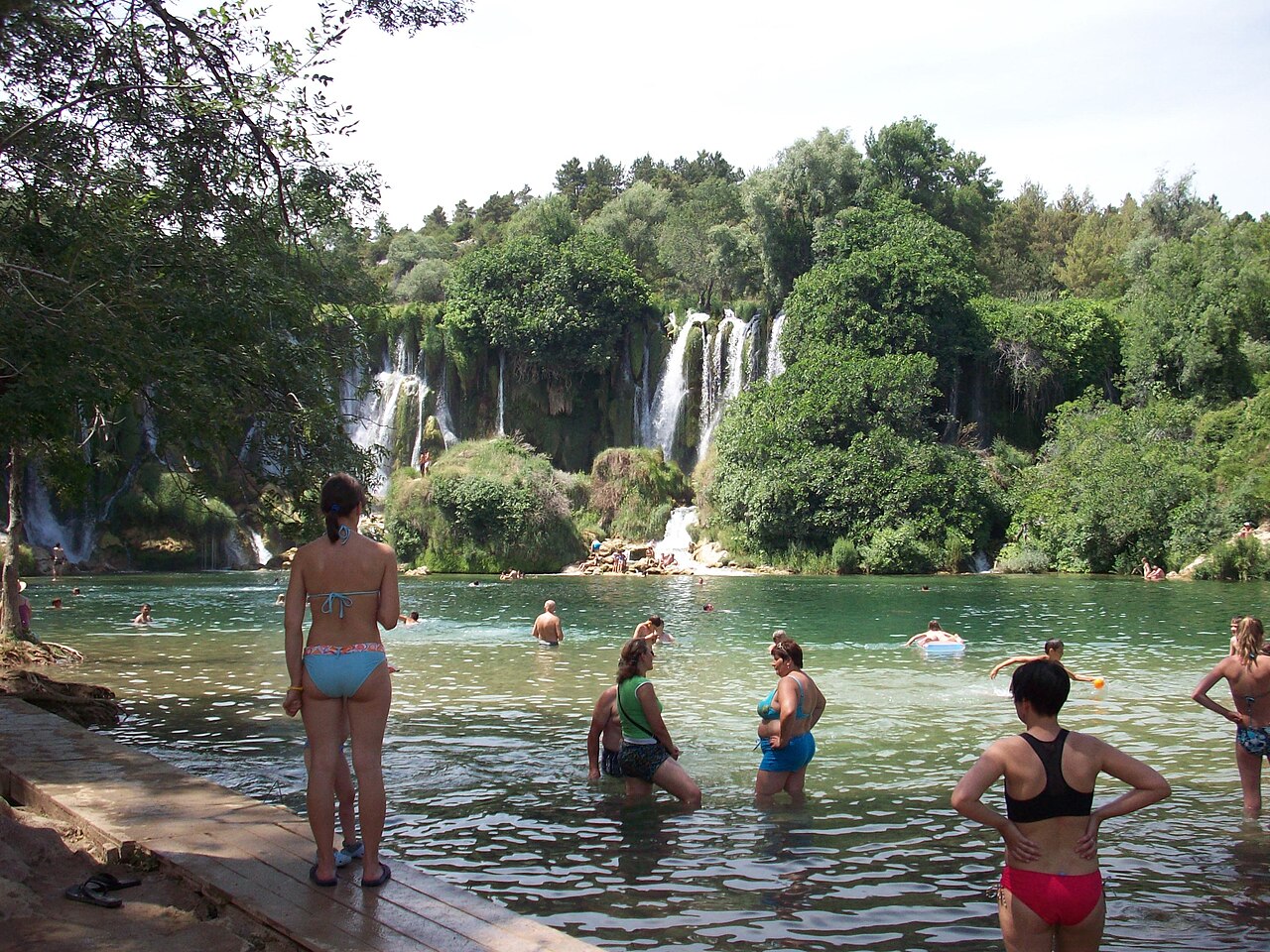 Kravica waterfalls cascading into a green pool near Mostar Bosnia