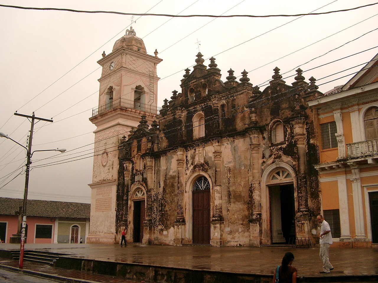 White facade and bell tower of La Merced church