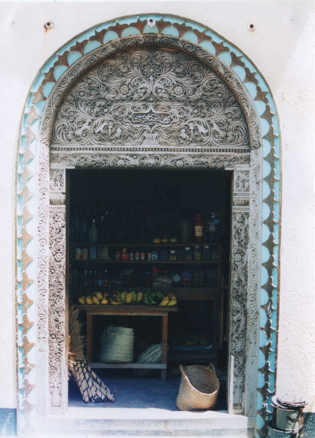 Carved wooden Swahili door with geometric patterns