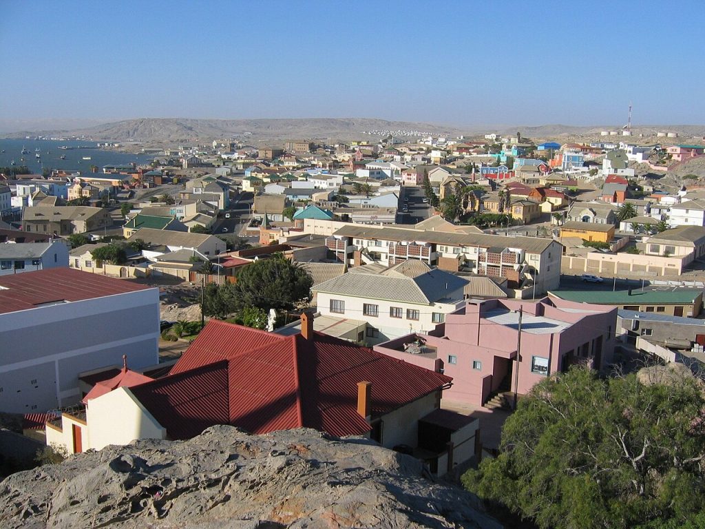 Colorful colonial-era houses spread across rocky hills