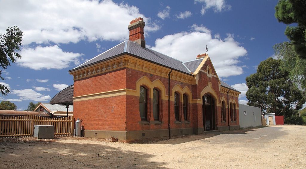 The red brick Maldon railway station with its platform