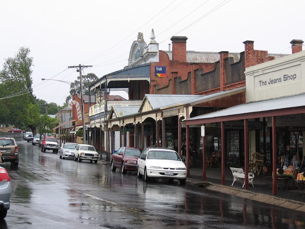 Historic shops with iron verandahs along a gold rush streetscape