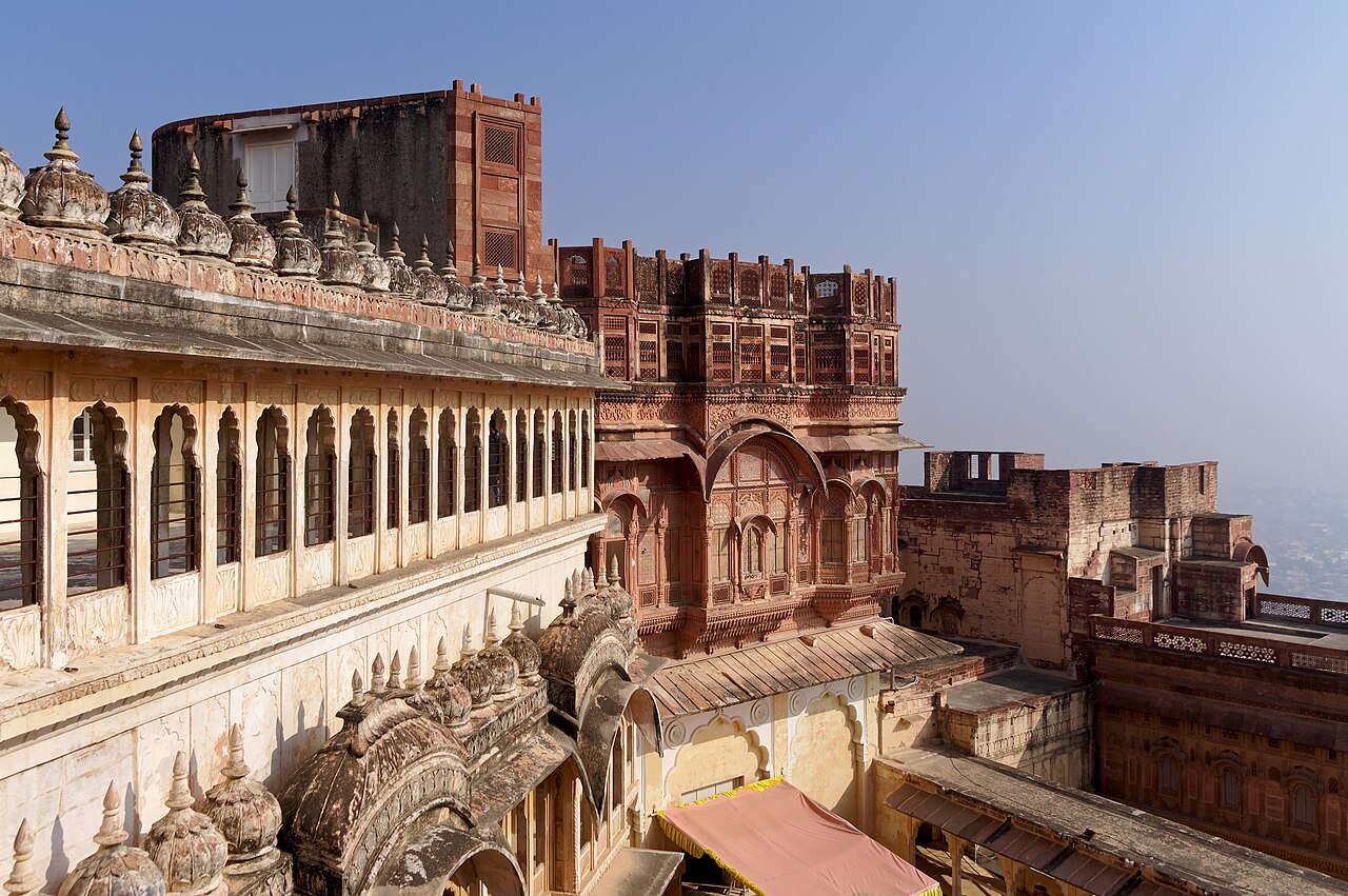 Massive sandstone walls of Mehrangarh Fort rising above Jodhpur