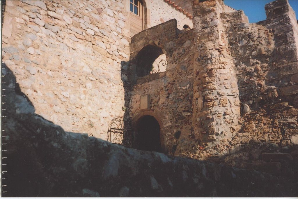 Arched stone gate leading into the Monemvasia castle town