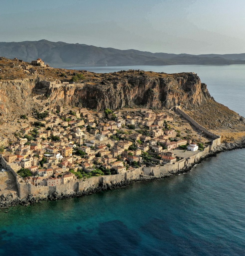 Stone houses of the Lower Town packed between the cliff and the sea