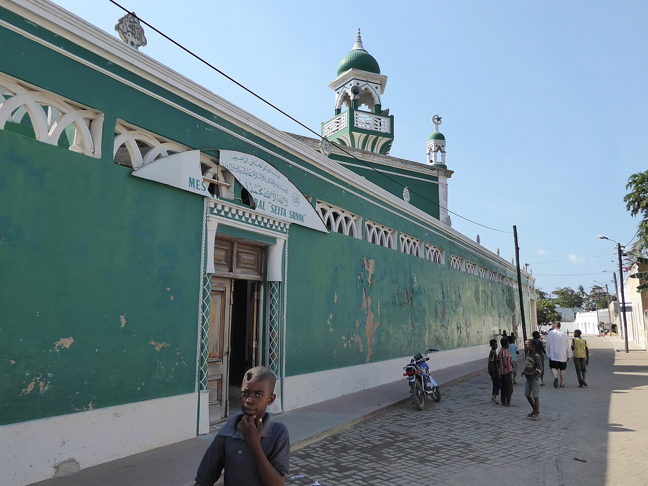 Mosque with a green and white facade on the island