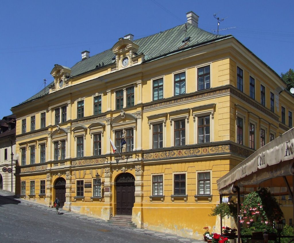 A yellow neo-Renaissance building with ornate facade