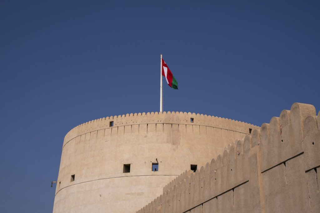 Flag flying above the great round tower of the fort